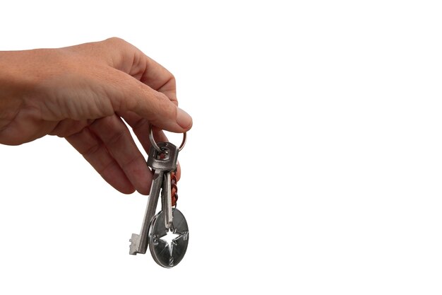 Keys held in hand isolated