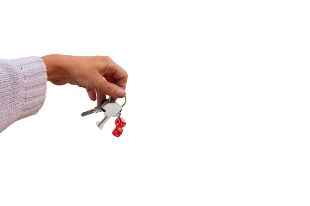 Keys held in hand isolated