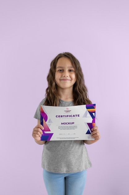 PSD kid holding certificate mockup