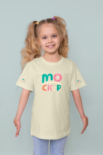 PSD kid wearing tshirt mockup design