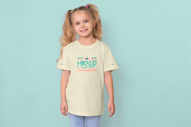 Kid wearing tshirt mockup design