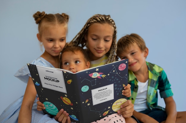 PSD kid with book  in studio mockup