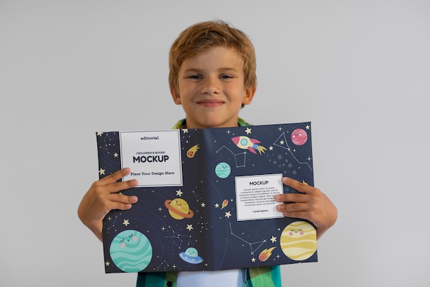 PSD kid with book  in studio mockup