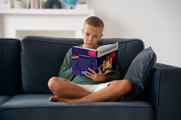 Kid with open book mockup