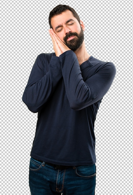 Knappe man met baard, het maken van slaap gebaar