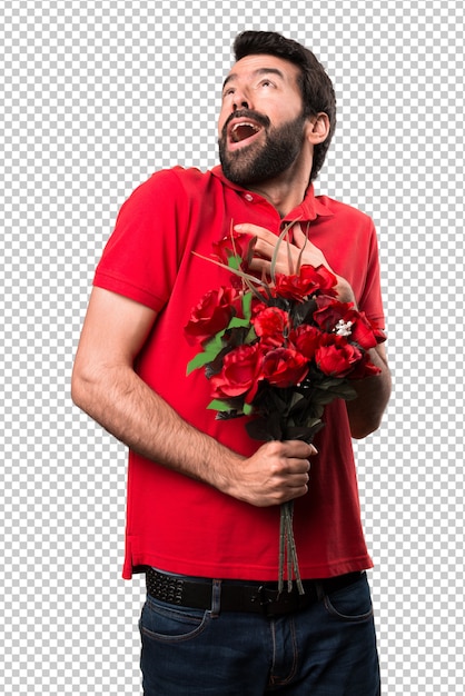 Knappe man met bloemen in de liefde