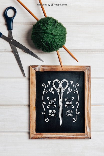 knitting mockup with slate and scissors