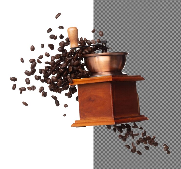 PSD koffiemolen vlieg drijft in de lucht vintage koffiemol voor koffiebonen om te verpletteren tot gemalen poeder over witte achtergrond geïsoleerde hoge snelheid sluiter bevriezen beweging