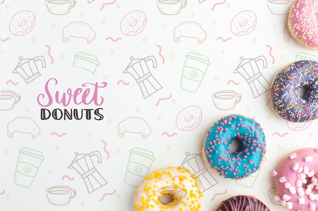 Kolorowe pączki mieszają się z makietą