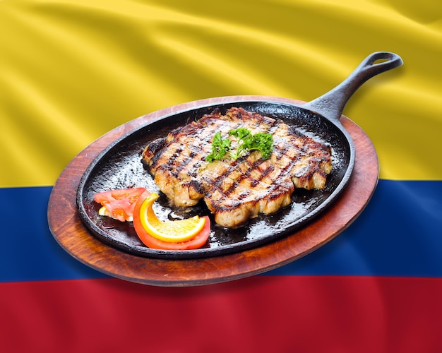 PSD kolumbijskie jedzenie z kolumbijską flagą w tle