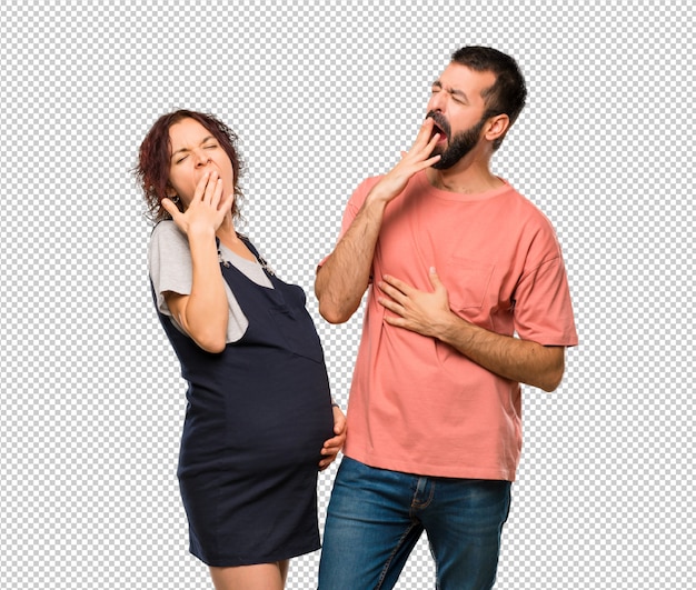 PSD koppel met zwangere vrouw geeuwende en die betrekking hebben op mond met de hand. slaperige uitdrukking