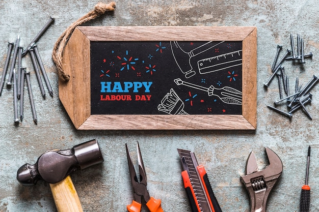 Labor day mockup with slate and tools