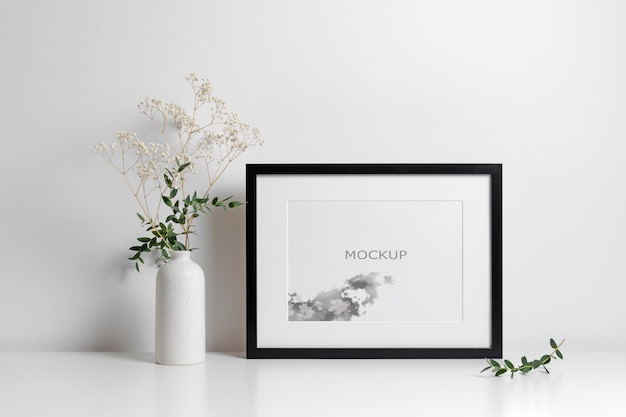 Landscape frame mockup in white minimalistic room interior