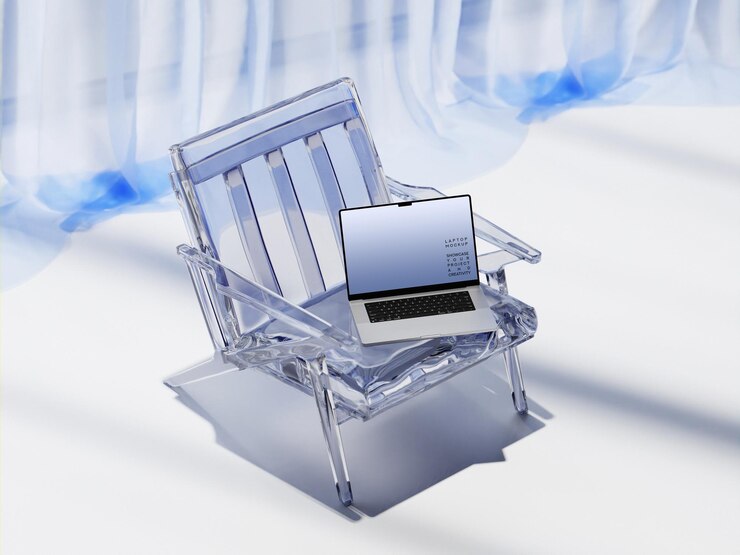 PSD laptop on a clear transparent acrylic chair