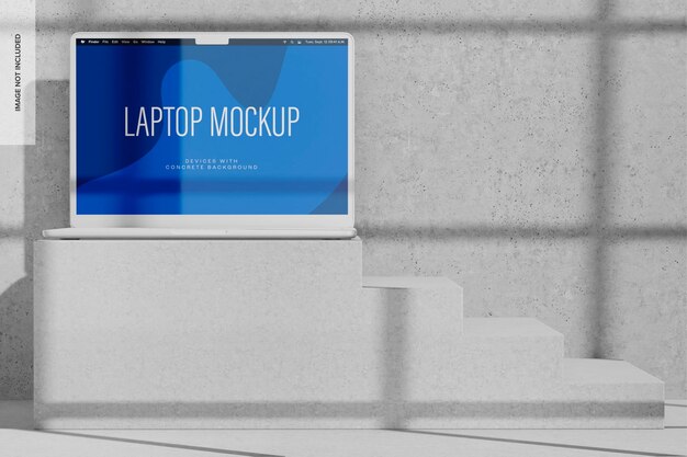 Computer portatile con sfondo concreto mockup