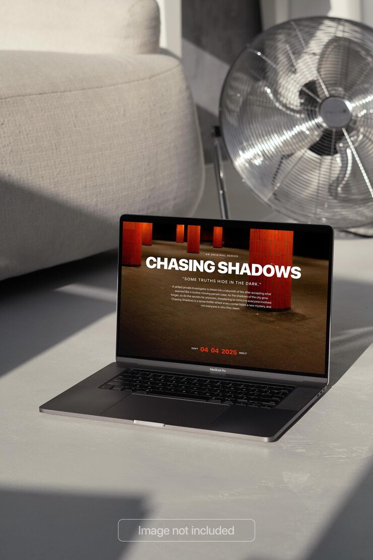 PSD laptop on a concrete floor realistic photo mockup