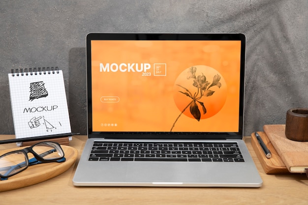 PSD laptop device mock-up on wood scene