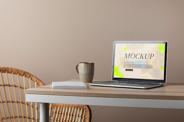 Laptop mock-up with wooden furniture scene