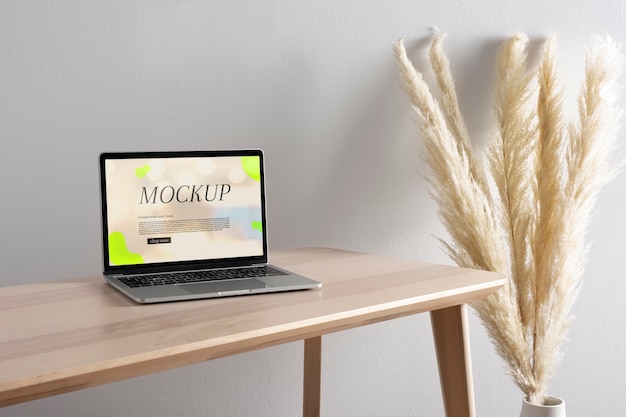 Laptop mock-up with wooden furniture scene