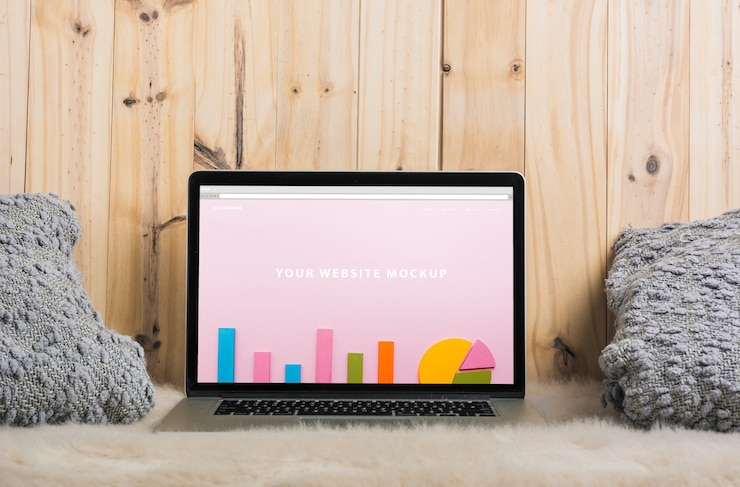 PSD laptop mockup on bed