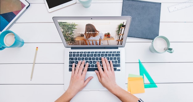 PSD laptop mockup on office desk