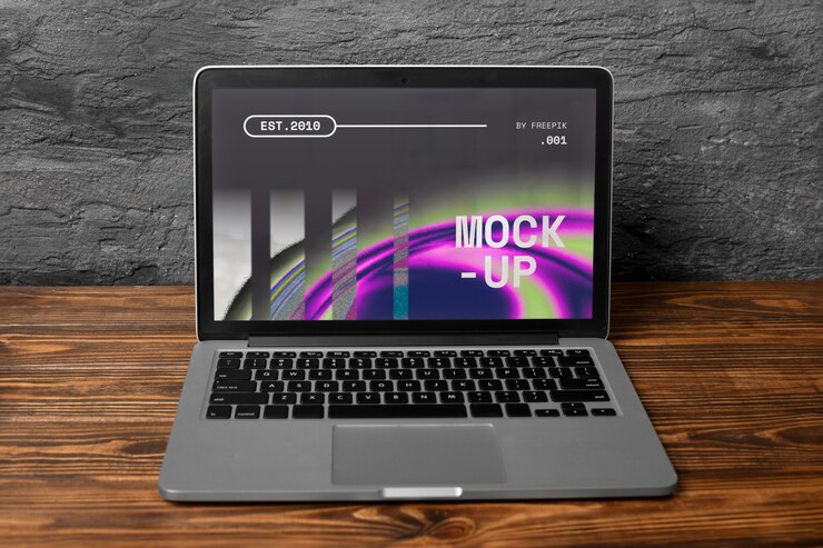 PSD laptop mockup on table