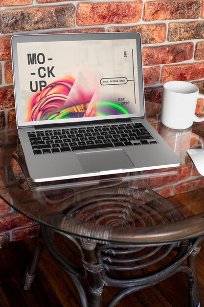 PSD laptop mockup on table