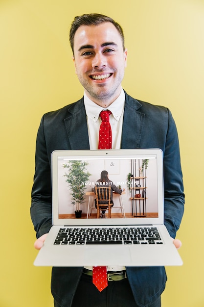 Laptop mockup with businessman