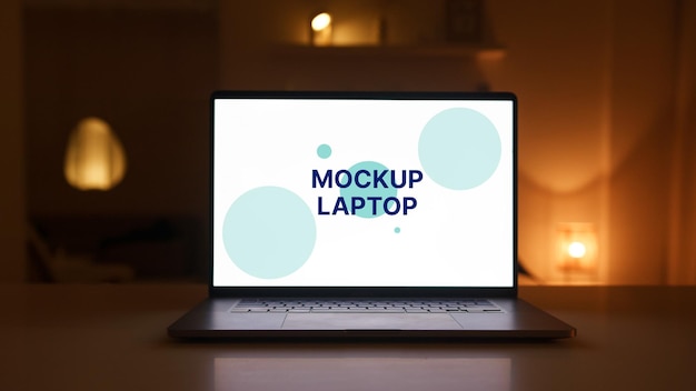 Laptop mockup with candles in the background