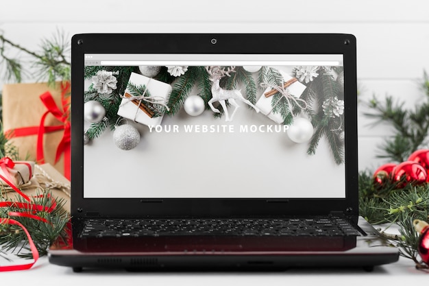 PSD laptop mockup with christmas concept