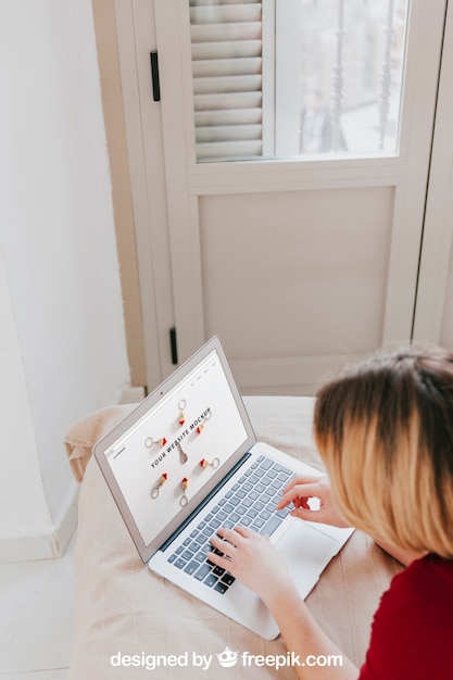 PSD laptop mockup with head of woman