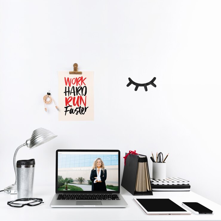 PSD laptop mockup with workspace composition