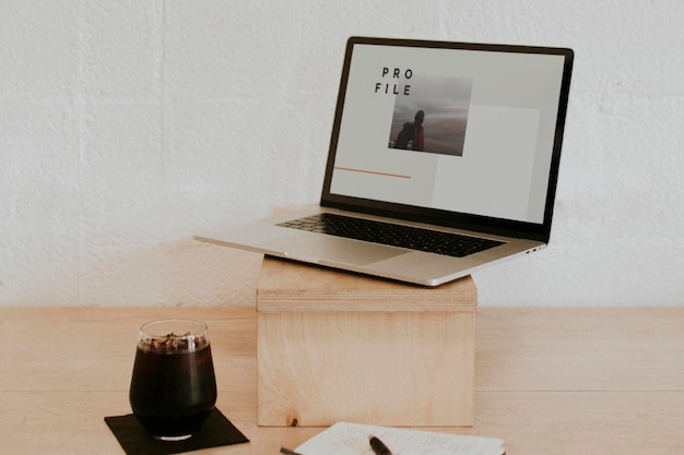 Laptop mockup on a wooden table