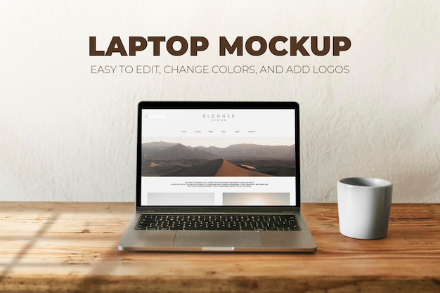 Laptop psd mockup with coffee mug on wooden table