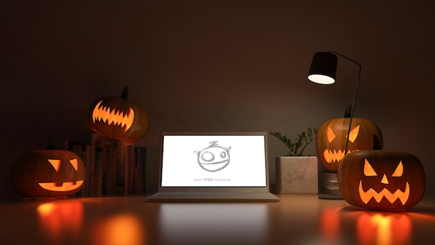 Laptop screen mockup with 3d rendering image of working table with pumpkin head