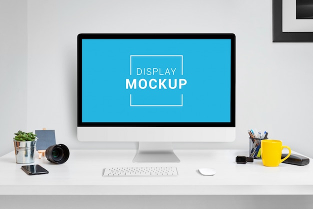 laptop, tablet and phone mockup in office