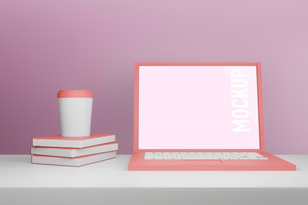 PSD laptop with a coffee cup on books mockup