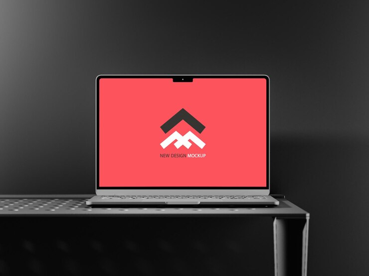 a laptop with a red sign that says we are the mountain on it