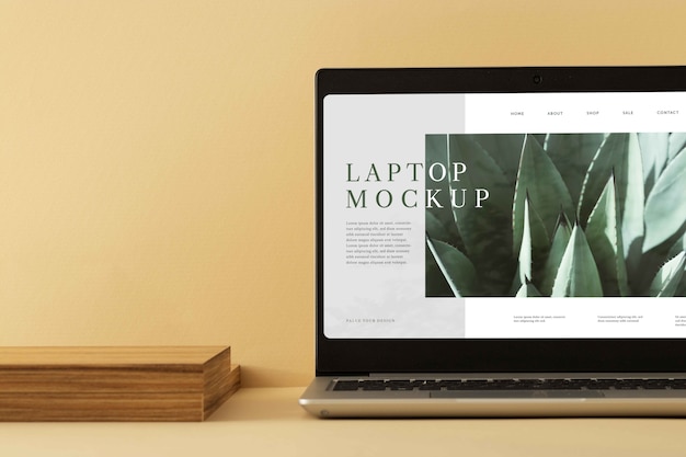 laptop and wooden piece arrangement