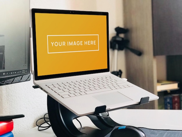 Laptop on workspace at home office mockup