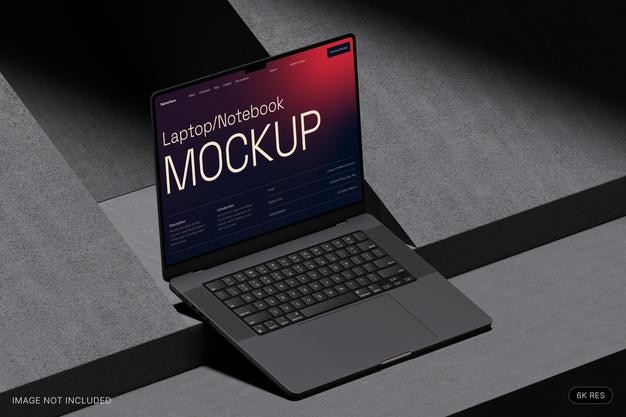 Laptopmockup in een donkere kamer op een betonnen basis met direct licht