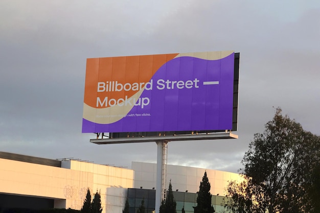 Large billboard mockup on cloudy sky