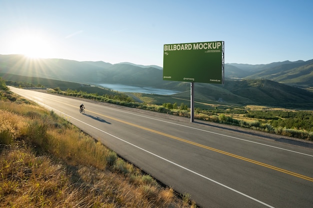 Large billboard mockup next to the road