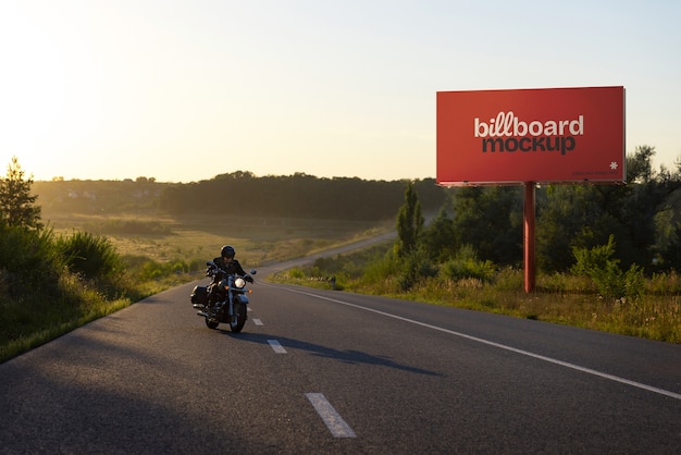 Large billboard mockup next to the road