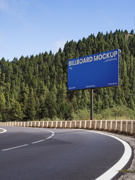 Large billboard mockup next to the road