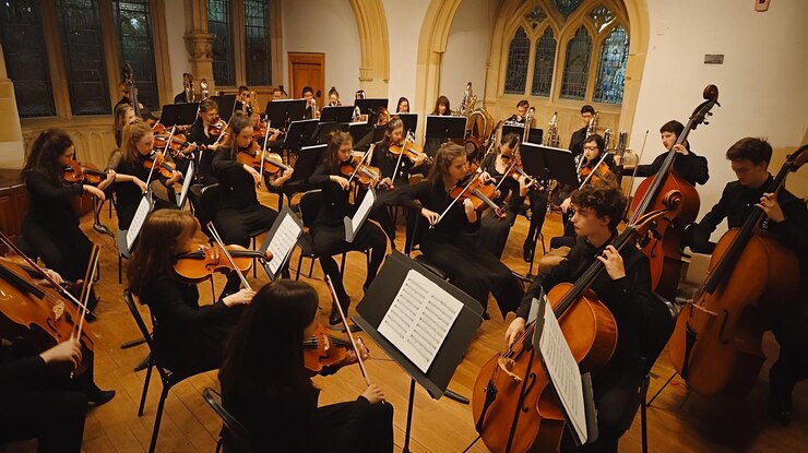 PSD large orchestra performing in a hall