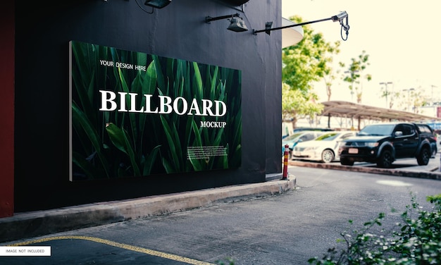 Large white blank billboard mockup displayed inside the mall