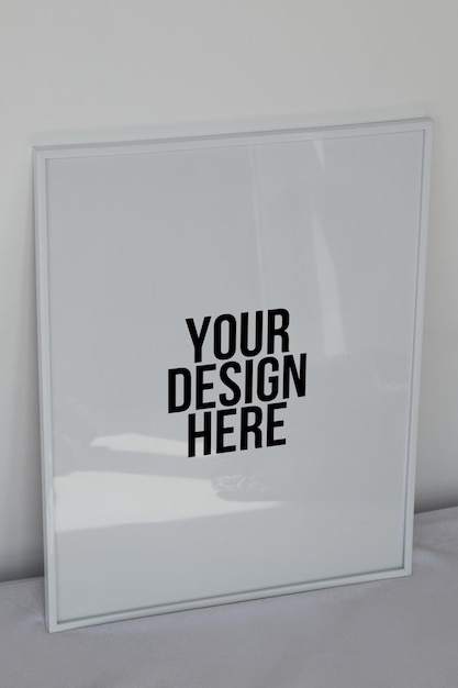 PSD large white photo frame on the floor mockup psd poster on the wall white background