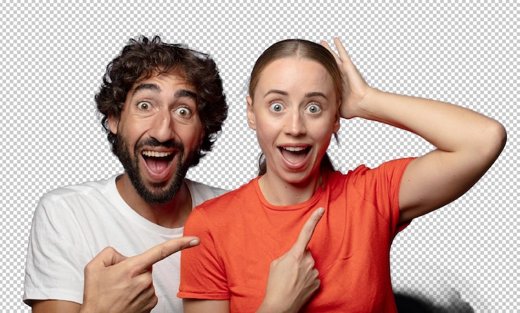 PSD laughing looking happy positive and surprised realizing a great idea pointing to lateral copy space