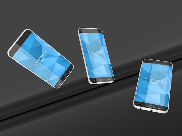 PSD levitating smartphone screens mockup in reflective black studio